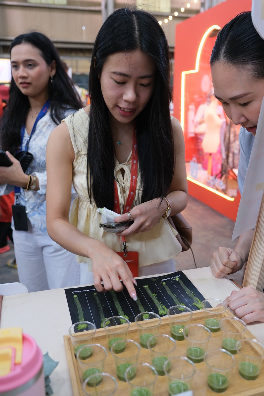 Guests tasting Forest Cloud matcha at a community event