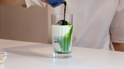 Forest Cloud iced matcha latte being poured during cafe team training.