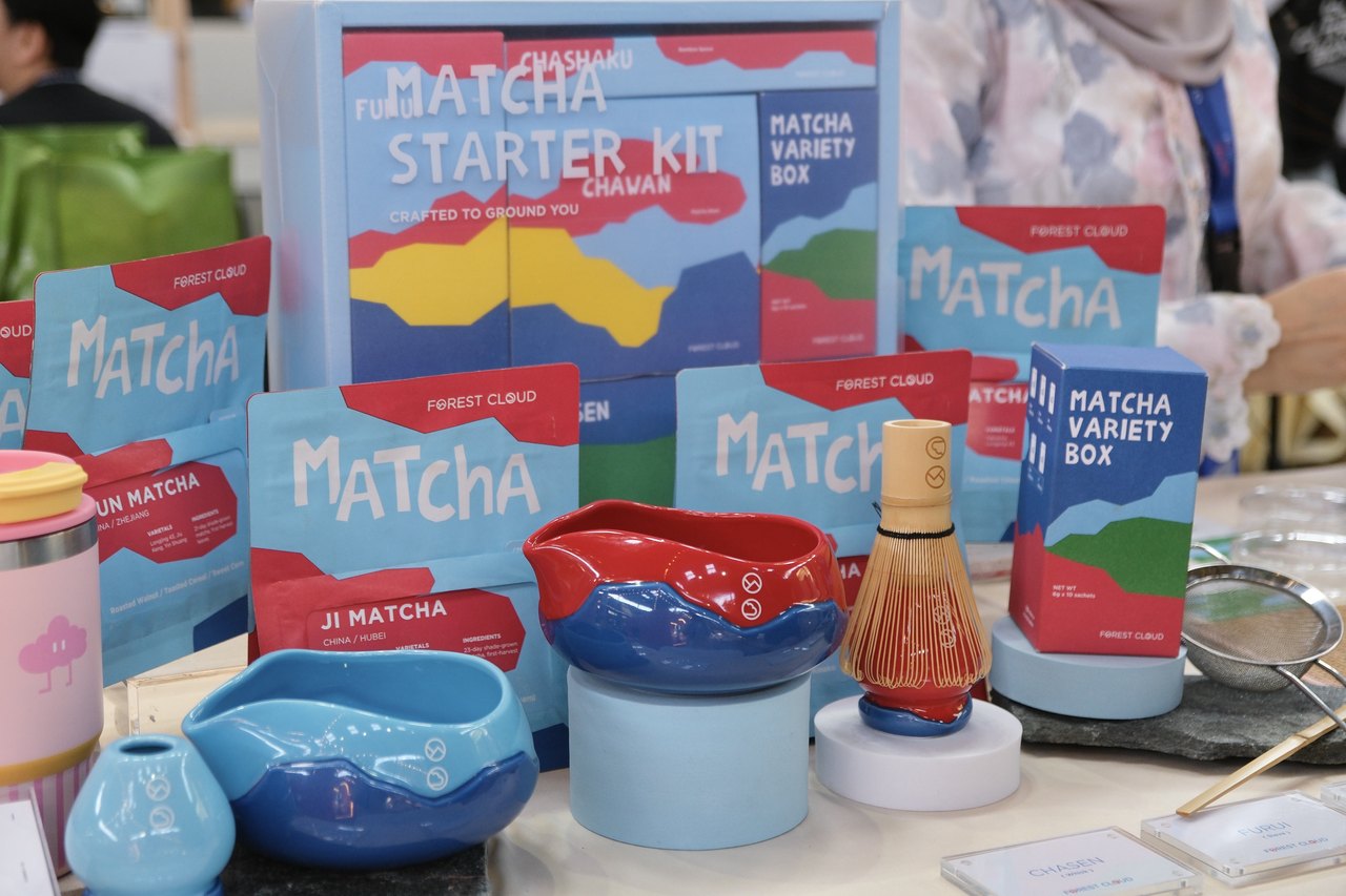 Forest Cloud matcha products and tools displayed for a partner event